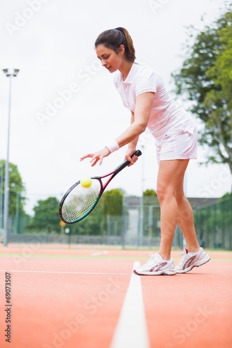 Tennis player playing a match on the court © WavebreakmediaMicro