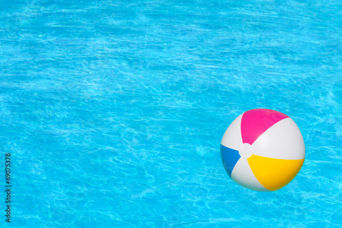 Inflatable ball in swimming pool