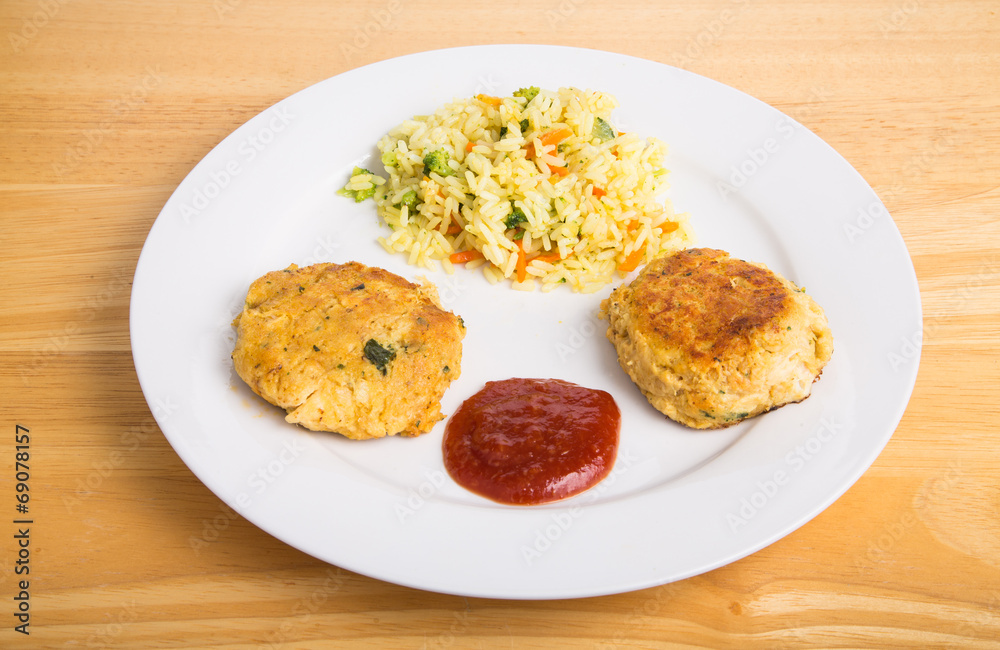 Two Crab Cakes with Cheesy Broccoli Rice