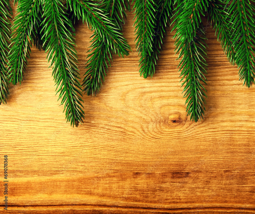Christmas fir tree on the wooden board Christmas fir tree on the wooden board