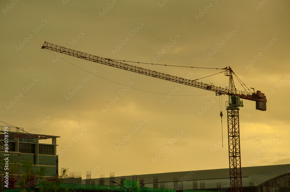 crane contructure with dark cloud