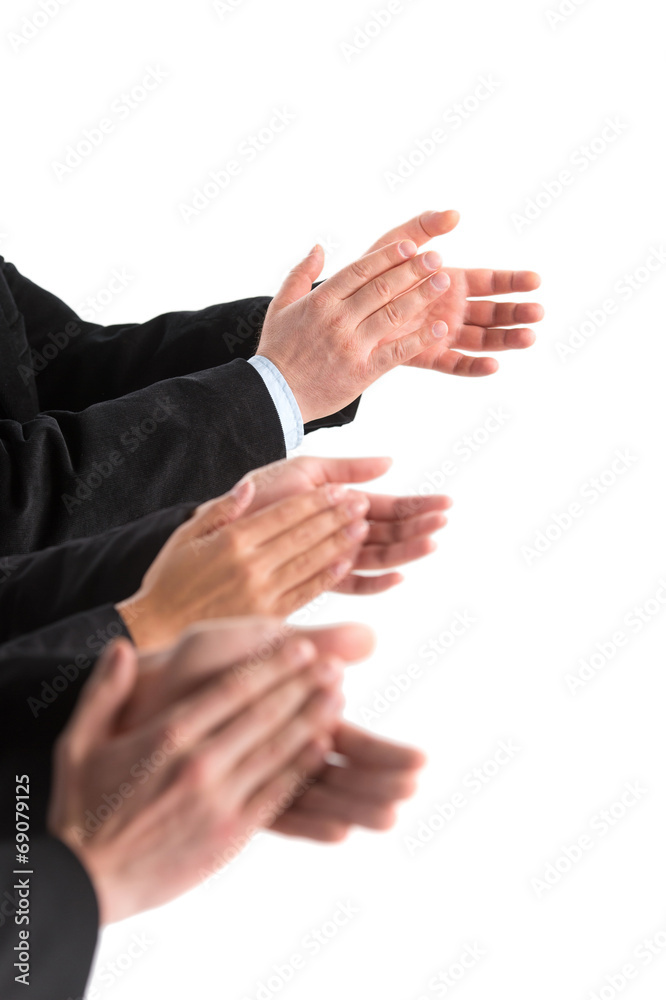 closeup of business people hands applauding at white background.