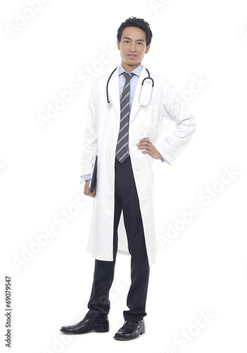Full body happy young doctor isolated on white background © east2