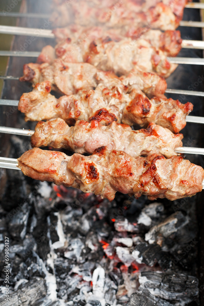 skewers with meat shish kebabs over burning coal