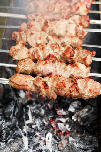 skewers with meat shish kebabs over burning coal