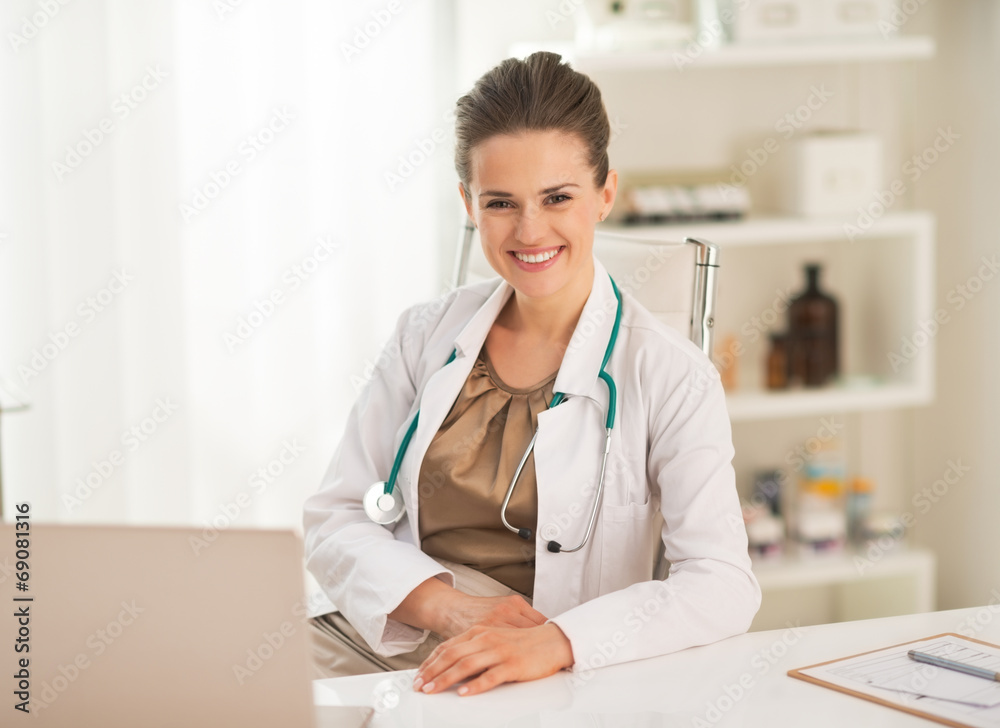 Portrait of smiling doctor woman in office Portrait of smiling doctor woman in office