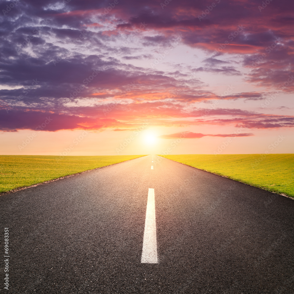 Driving on an empty road at sunsrise Driving on an empty road at sunsrise