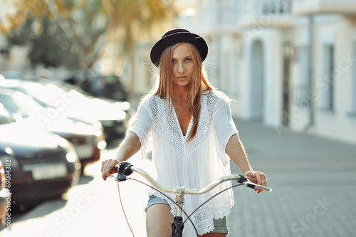 Beautiful blonde on a bicycle