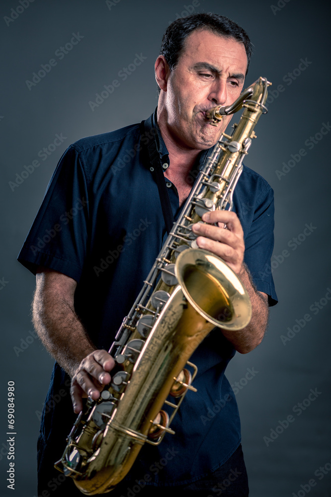 Fototapeta premium musician with saxophone