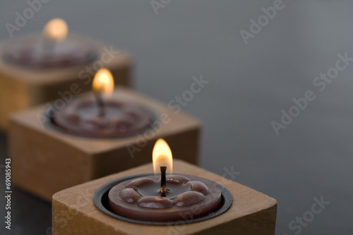 Three small candles in row