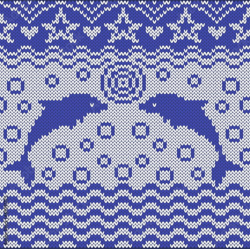 Knitted seamless pattern with dolphins and stars