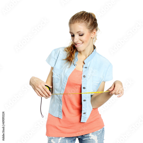emotional girl stares down and ready to measure 