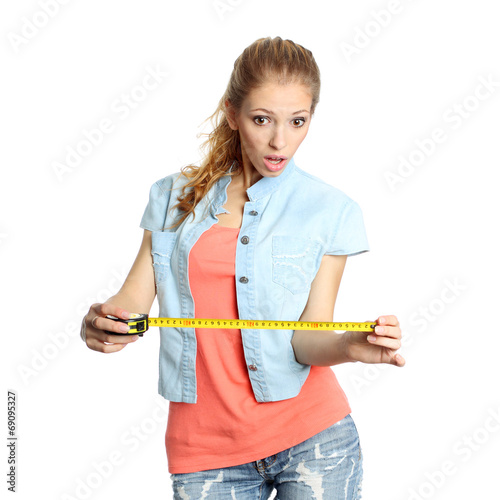 emotional girl stares down and ready to measure 