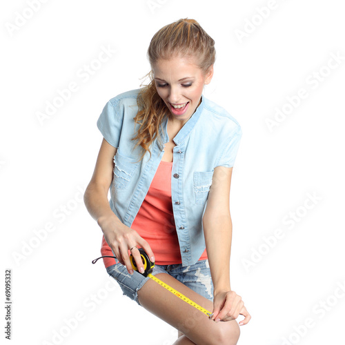 emotional girl stares down and ready to measure 