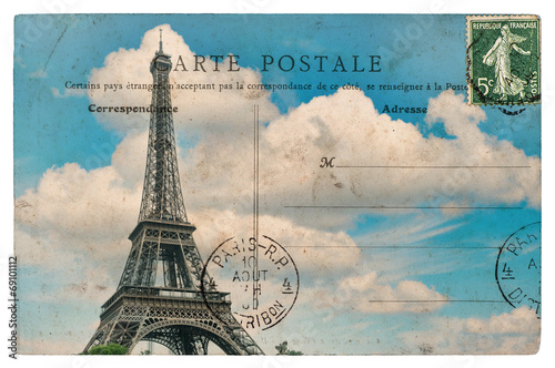 vintage postcard from paris with eiffel tower over blue sky © LiliGraphie
