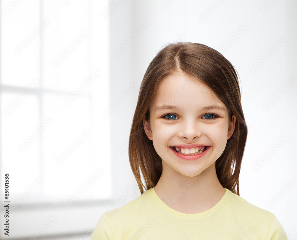 smiling little girl over white background smiling little girl over white background
