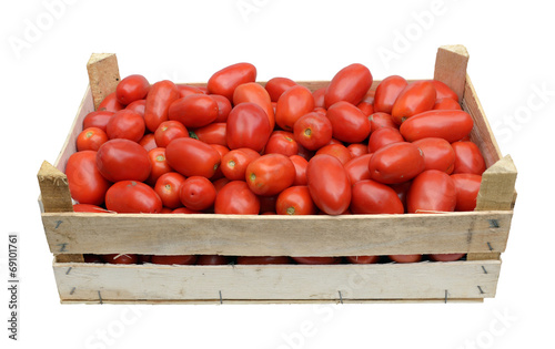 wooden crate full of tomatoes