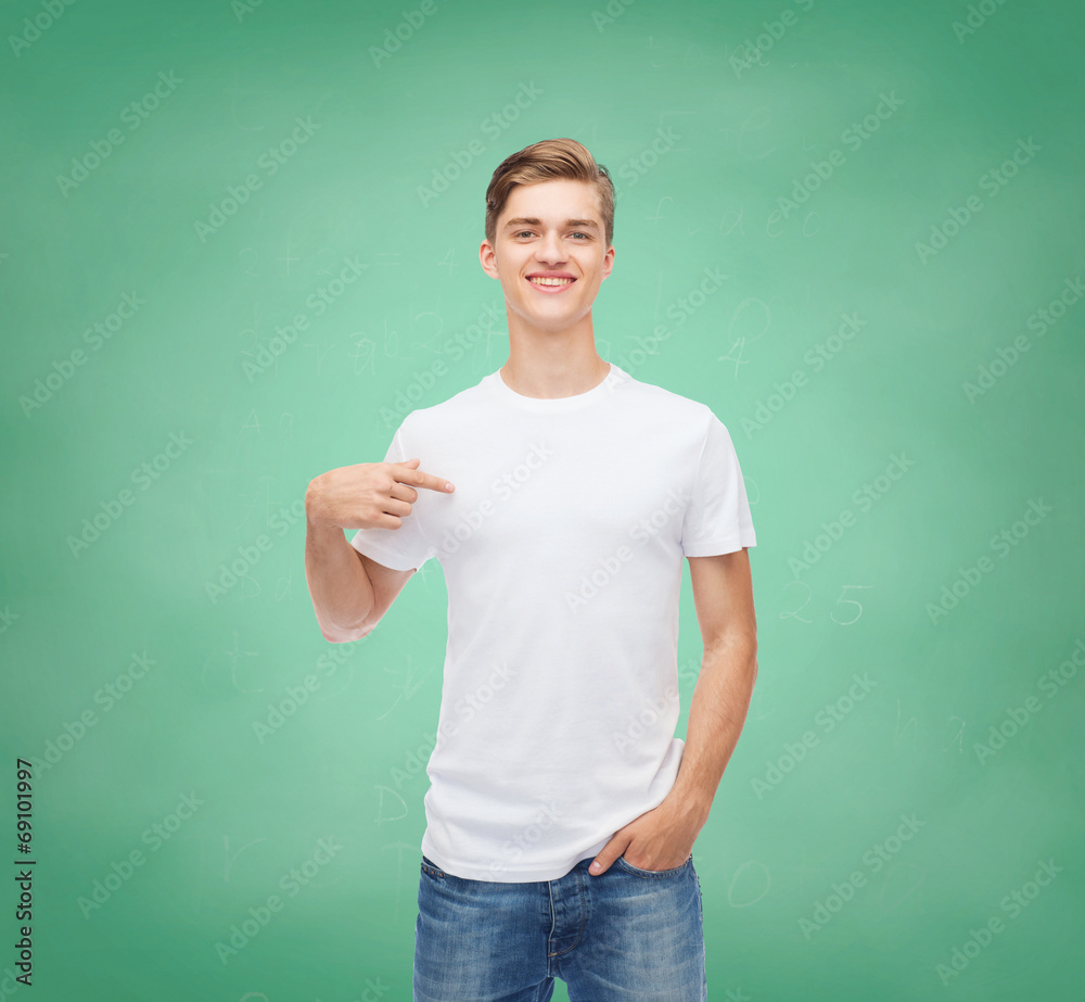 smiling young man in blank white t-shirt