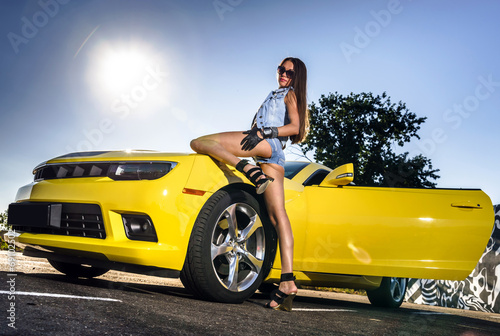 Luxury glamour girl and yellow sport car