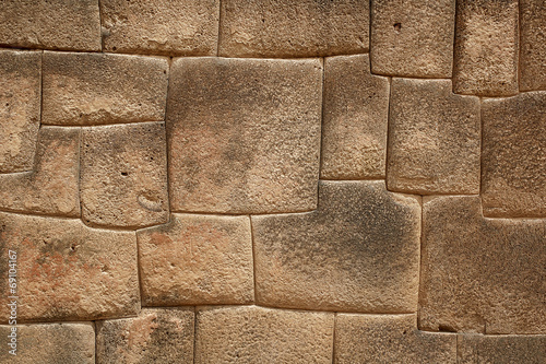 The multi-sided granite stones in ancient Inca wall street, Puno