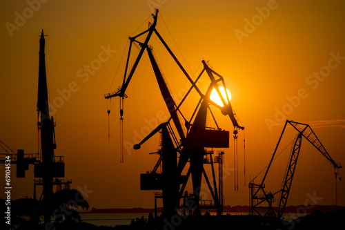 Canvas Print Shipyard cranes at sunset at Pula, Istria, Croatia