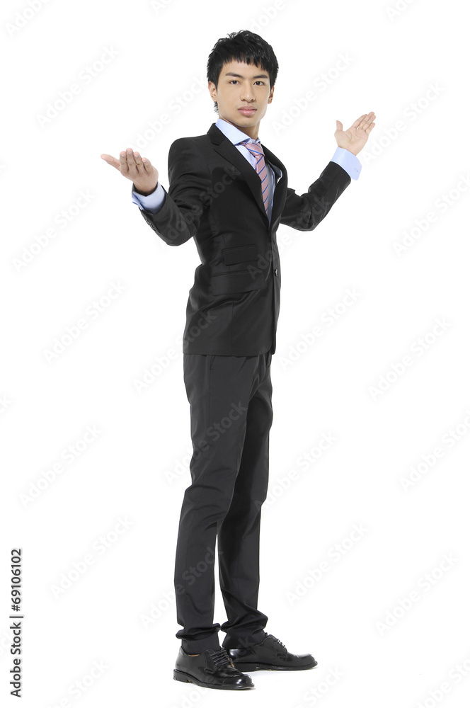 confused young businessman on an isolated confused young businessman on an isolated