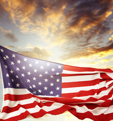 American flag in sunny sky