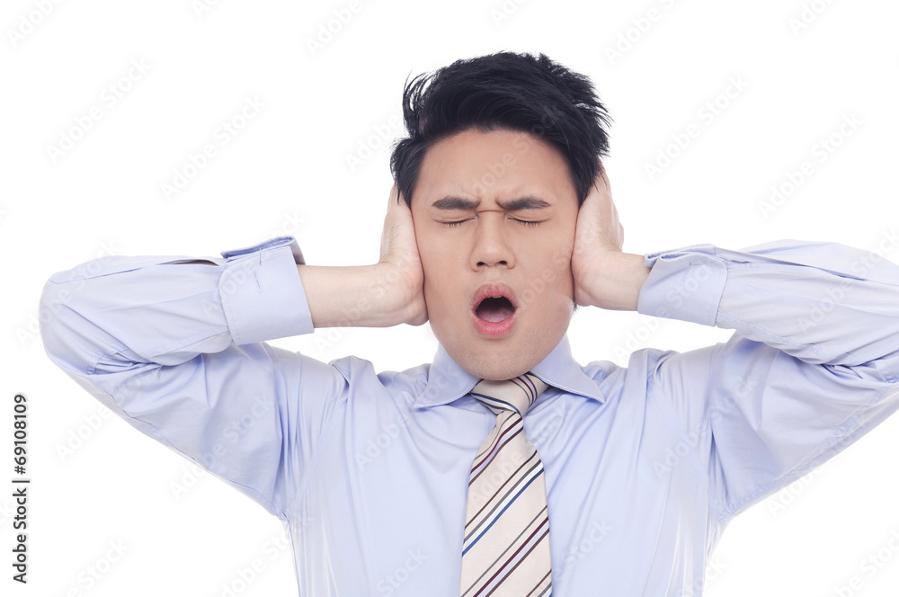 Stressed businessman tear his hair out, crazy face expression Stressed businessman tear his hair out, crazy face expression