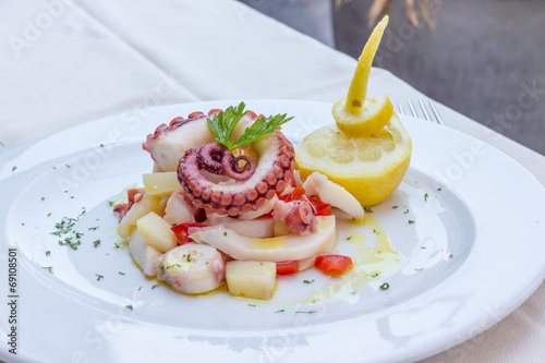 Appetizer of cuttlefish octopus and potatoes