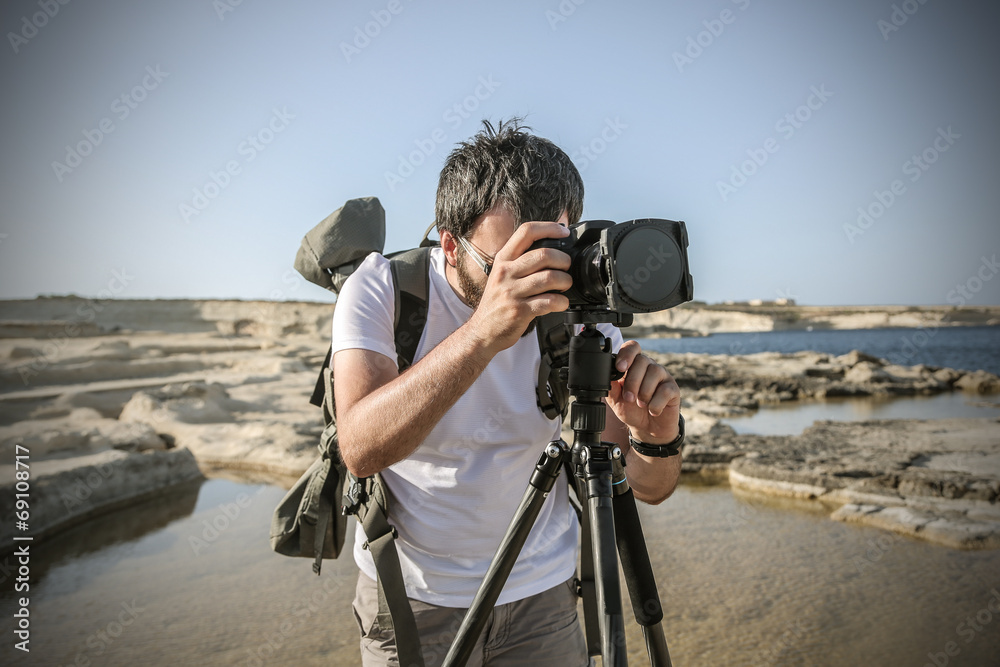 professional photographer shooting at the beach
