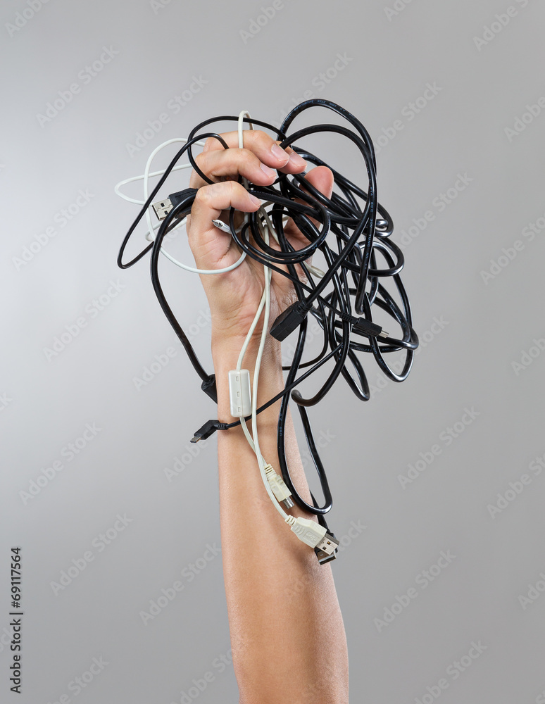 Male hand hold group of cable cords
