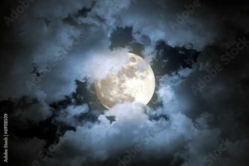 Cloudy full moon night photo