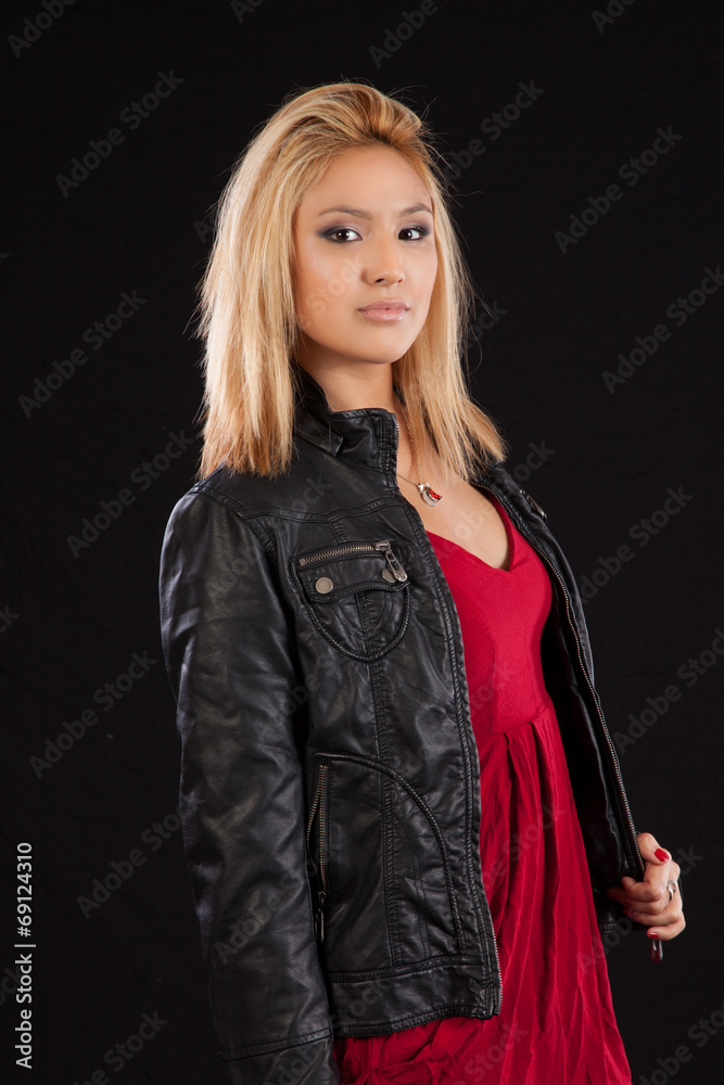 Fototapeta premium Blond woman looking thoughtfully at the camera