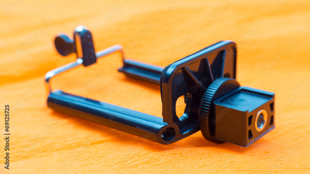 Fototapeta premium Shining Metal Mobile Smart Phone Landcsape Mount Holder Isolated