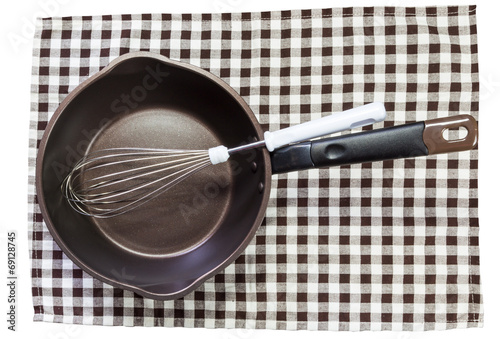 Bild auf Leinwand Pan and whisk on napery