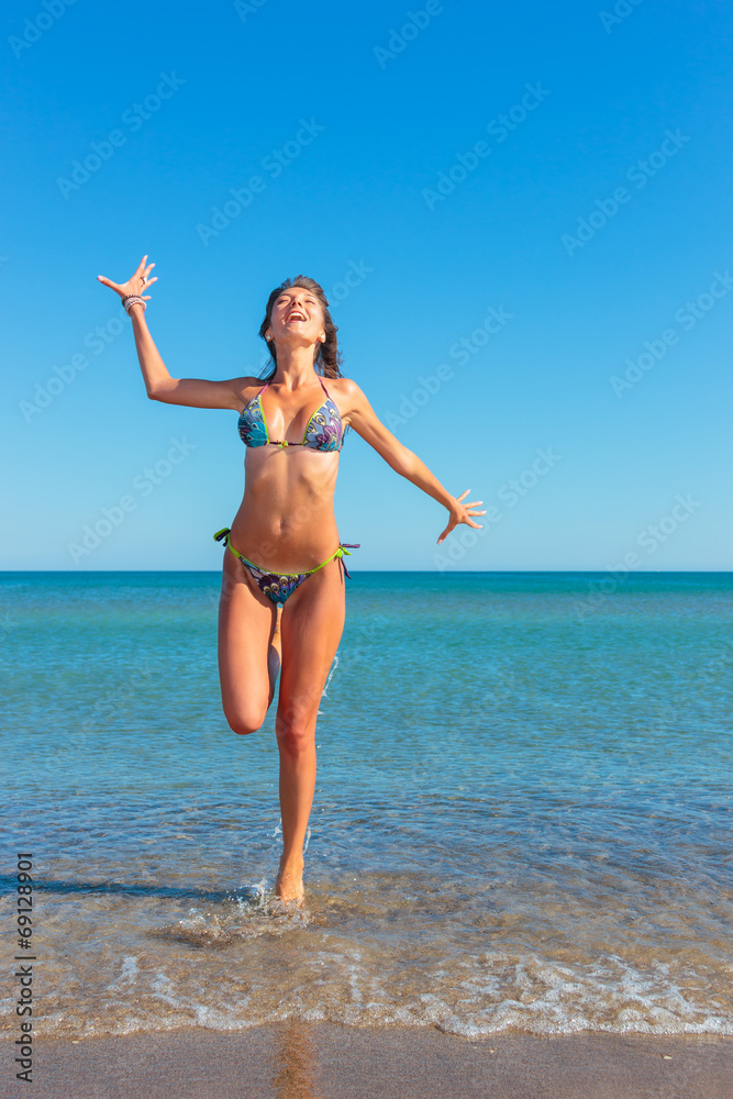 woman in bikini, outdoor on the beach woman in bikini, outdoor on the beach