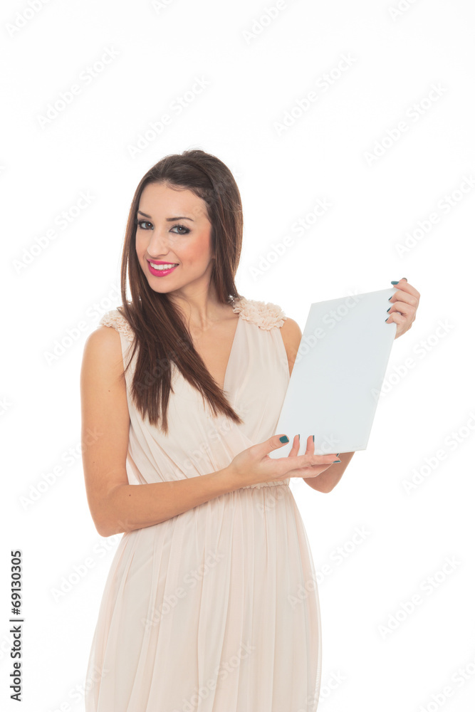 Attractive young woman holds an empty white board Attractive young woman holds an empty white board