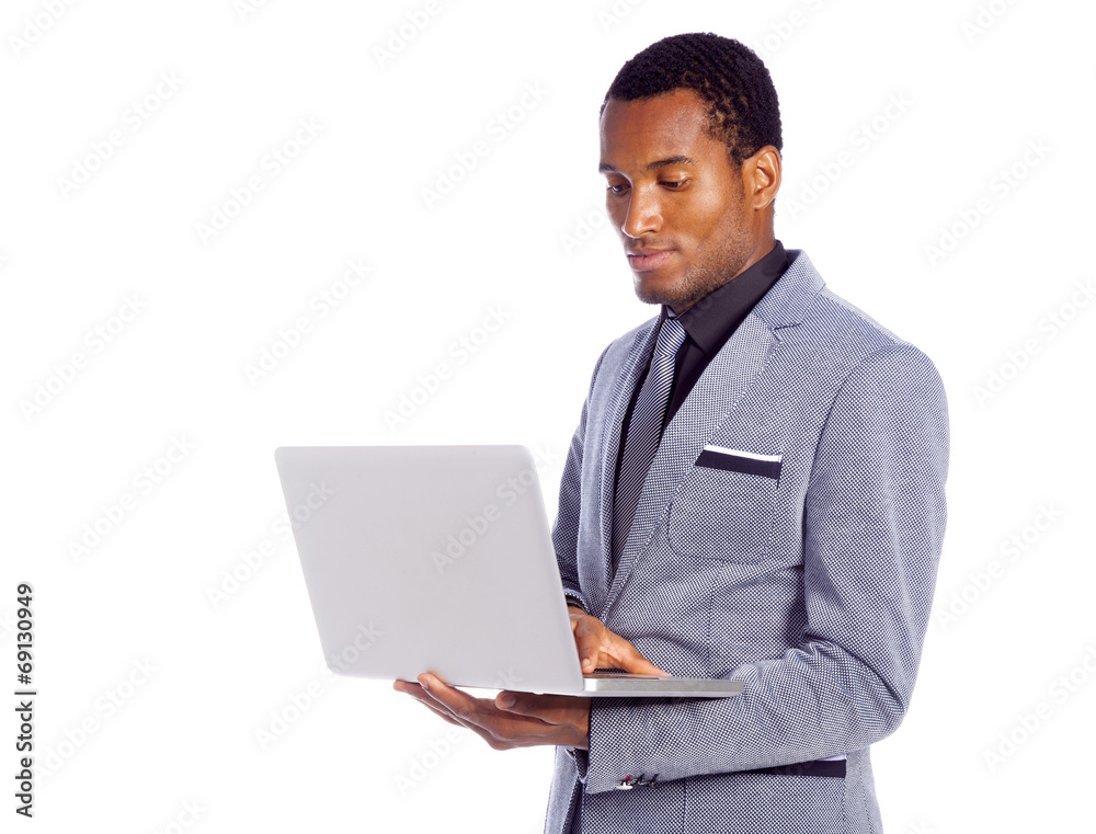Business man with a laptop, isolated on white background Business man with a laptop, isolated on white background