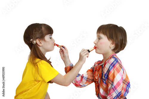Girls color each other lipstick