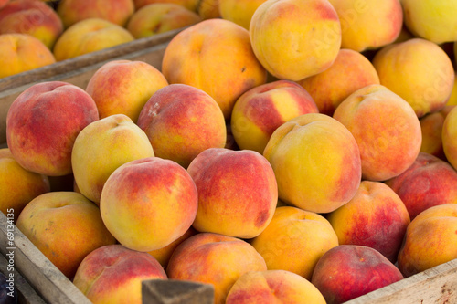 Organic peaches at the market