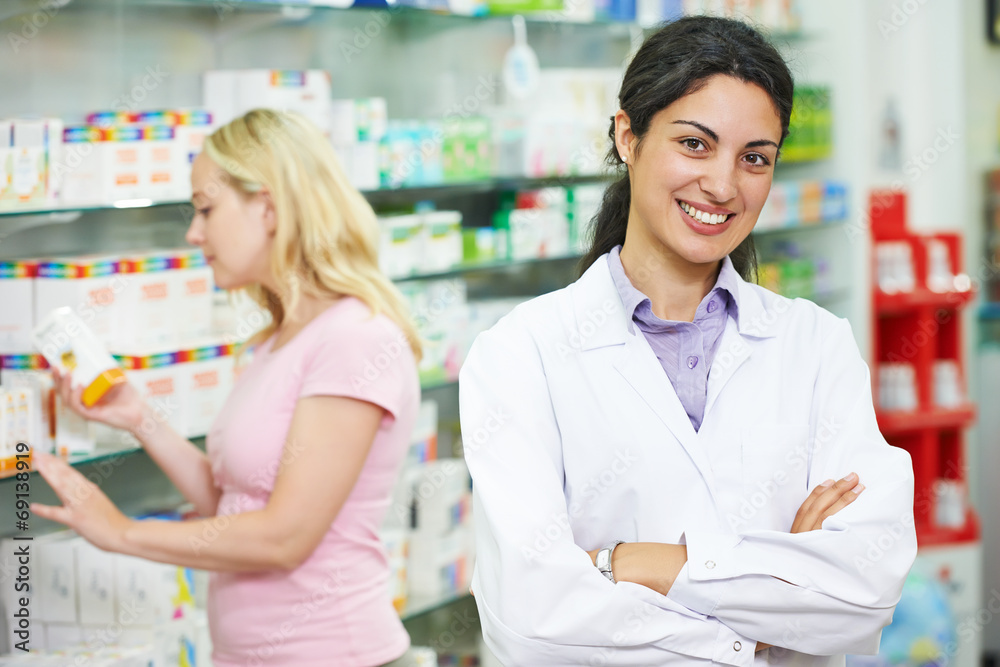 Pharmacy chemist portrait in drugstore