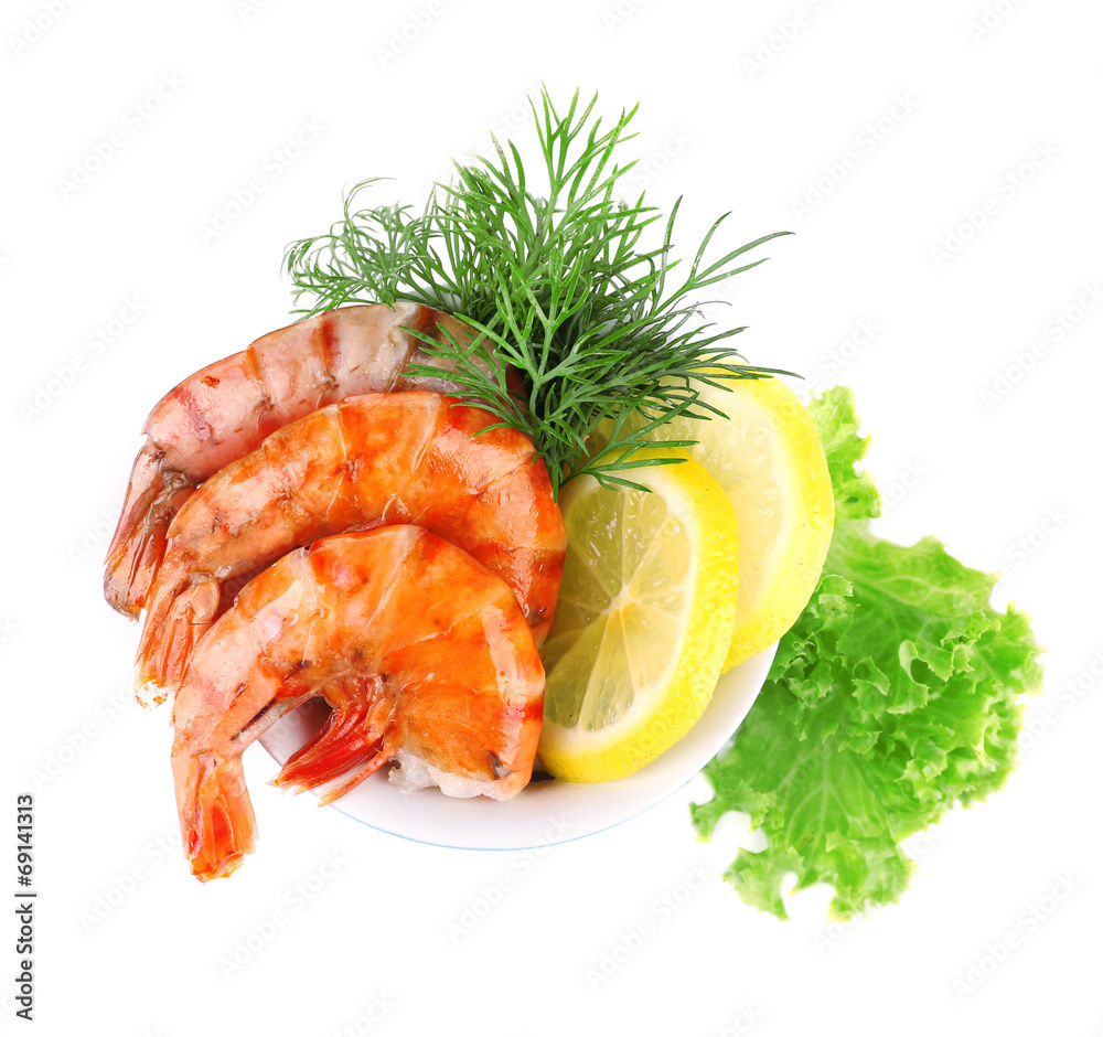 Fresh boiled prawns with dill and lemon in a blue round bowl Fresh boiled prawns with dill and lemon in a blue round bowl