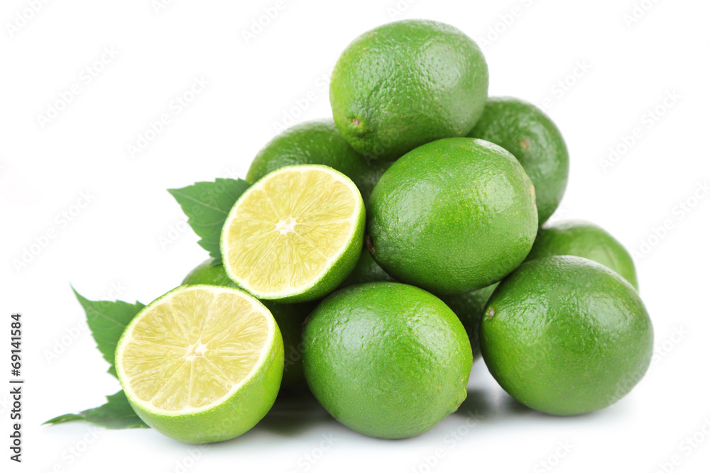 Fresh juicy limes, isolated on white