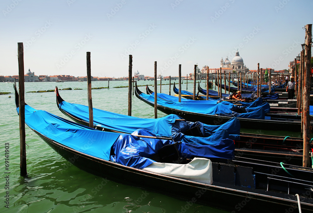 Gondolas moored by Saint Mark square. Venice, Italy, Europe