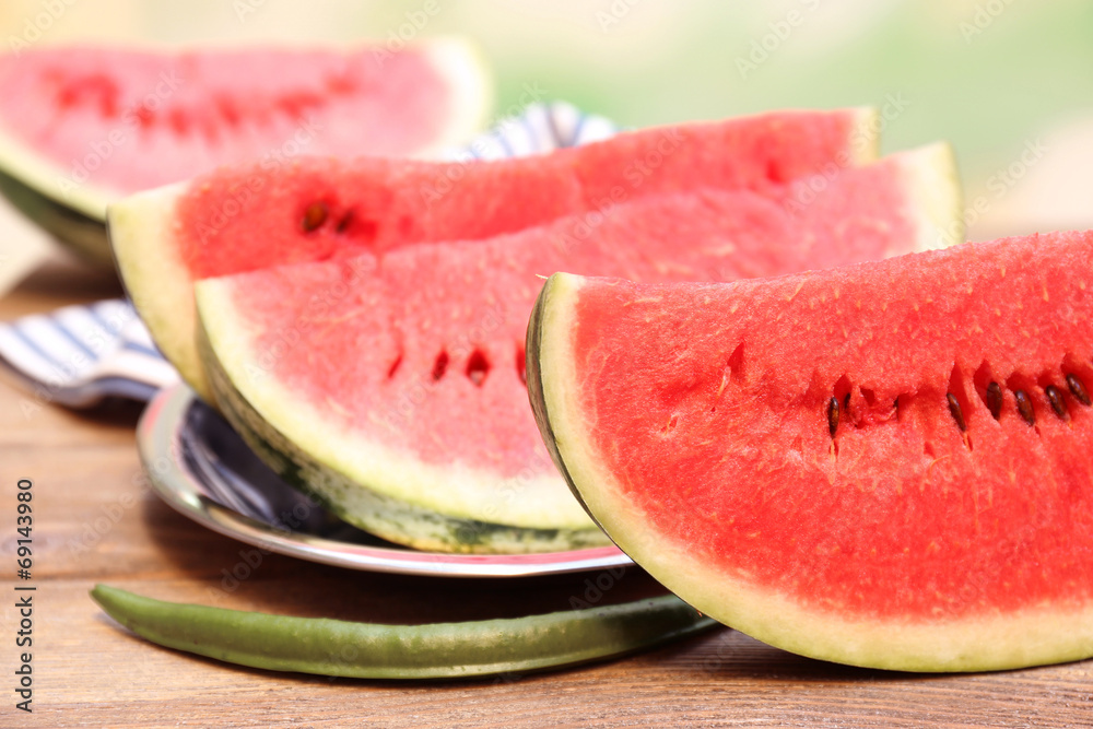 Fresh slice of watermelon on table outdoors, close up