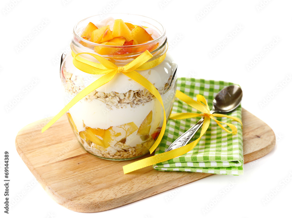 Healthy breakfast - yogurt with fresh peach and muesli served Healthy breakfast - yogurt with fresh peach and muesli served