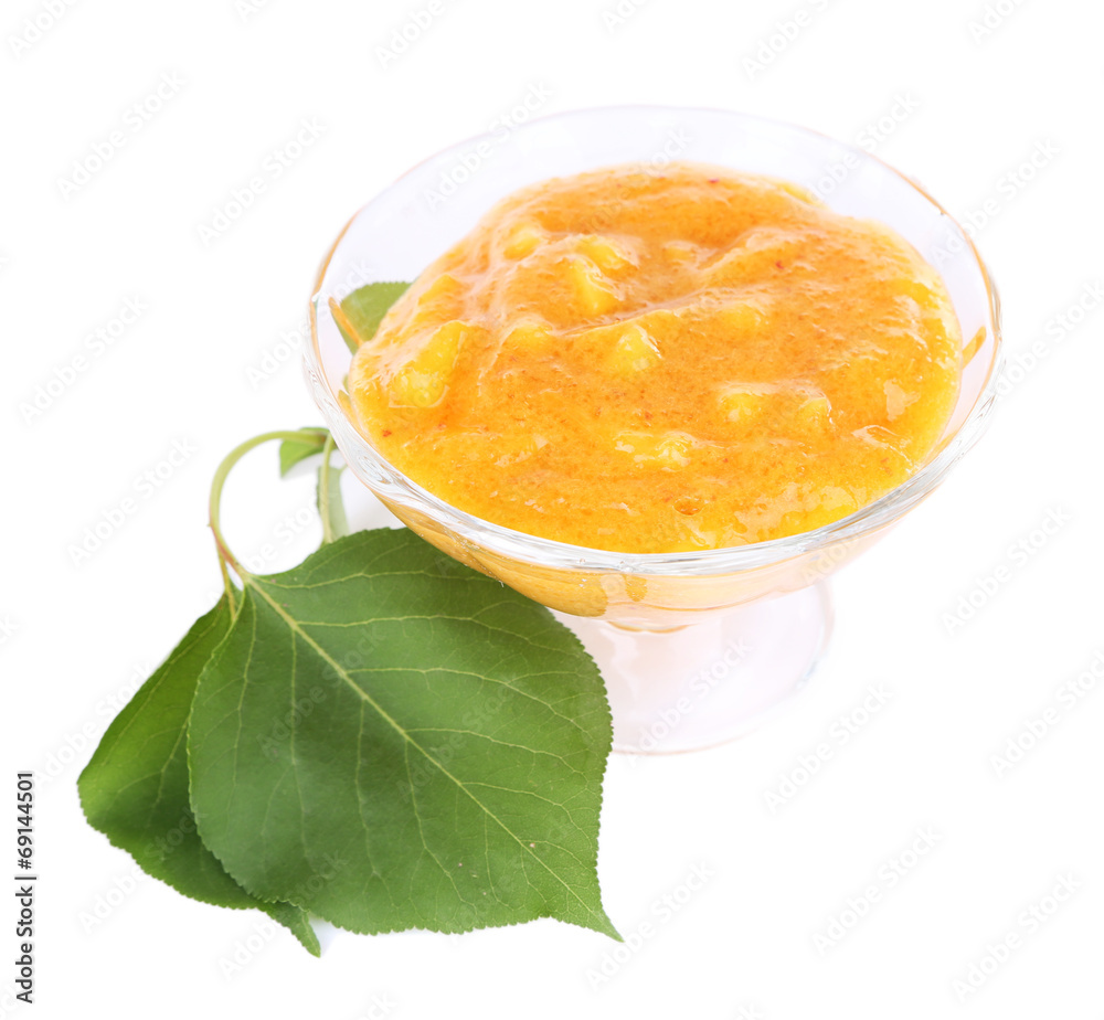 tasty apricot jam with leaves, isolated on white tasty apricot jam with leaves, isolated on white