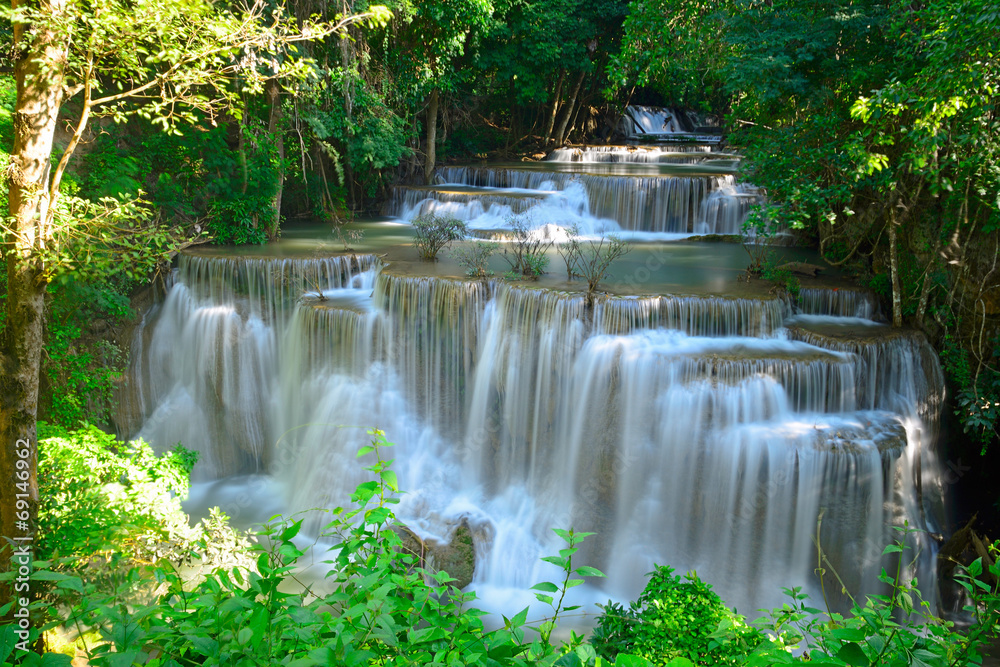 Waterfall in tropical deep forest at Huay Maekhamin Waterfall in tropical deep forest at Huay Maekhamin