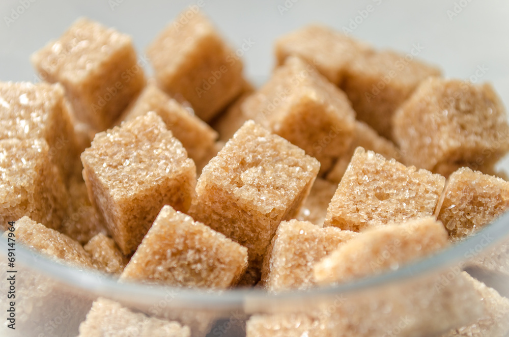 Brown sugar cubes in a glass Brown sugar cubes in a glass