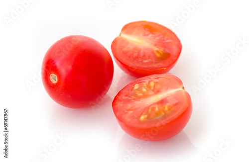 Three fresh tomatoes with isolated on white background